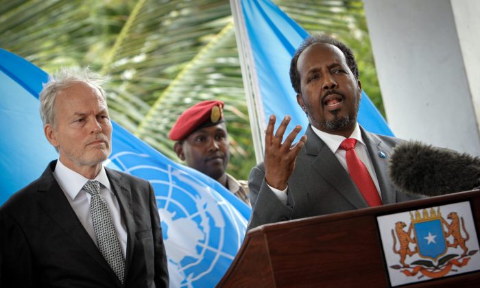 The battle for political legitimacy in somalia is between __________.